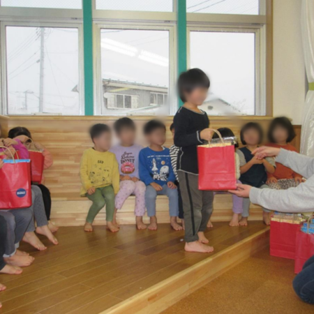 クリスマス・ギビング 秋田豪雨被災地の子どもたちへ笑顔の種まき